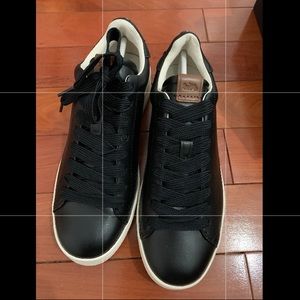 Coach c101 black leather sneakers.